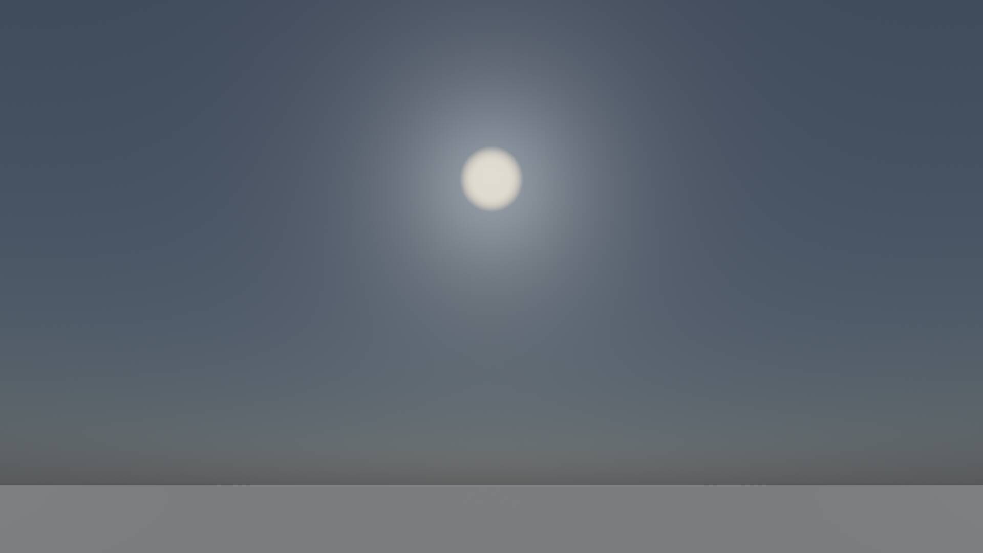A blueish gray sky with a fuzzy sun in the middle, and some subtle reddening near the horizon