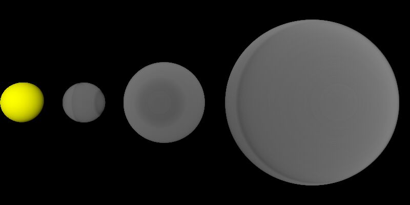Same three spheres, now all dark grey